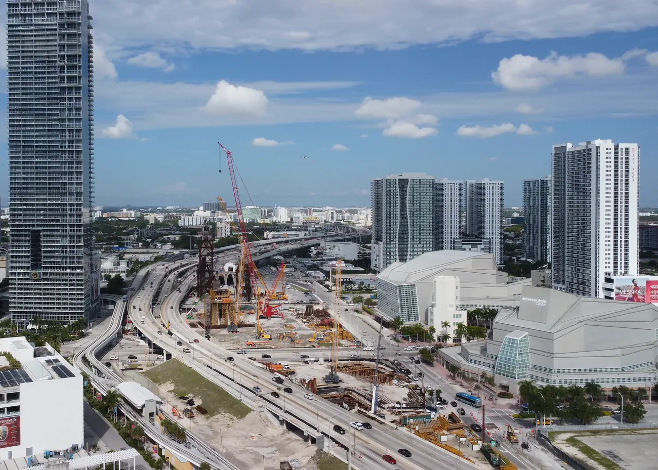 April 2023: the same view, with only piers and cranes where the bridge now stands.